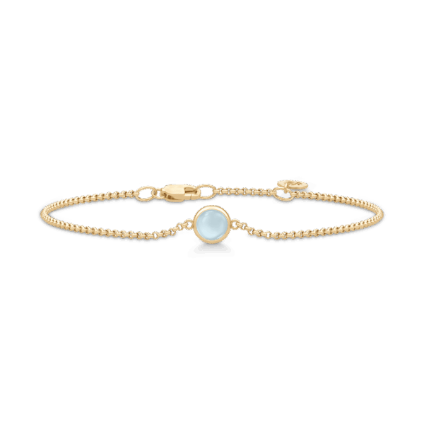 Julie Sandlau Primini armbånd i forgyldt med Milky Aqua krystal